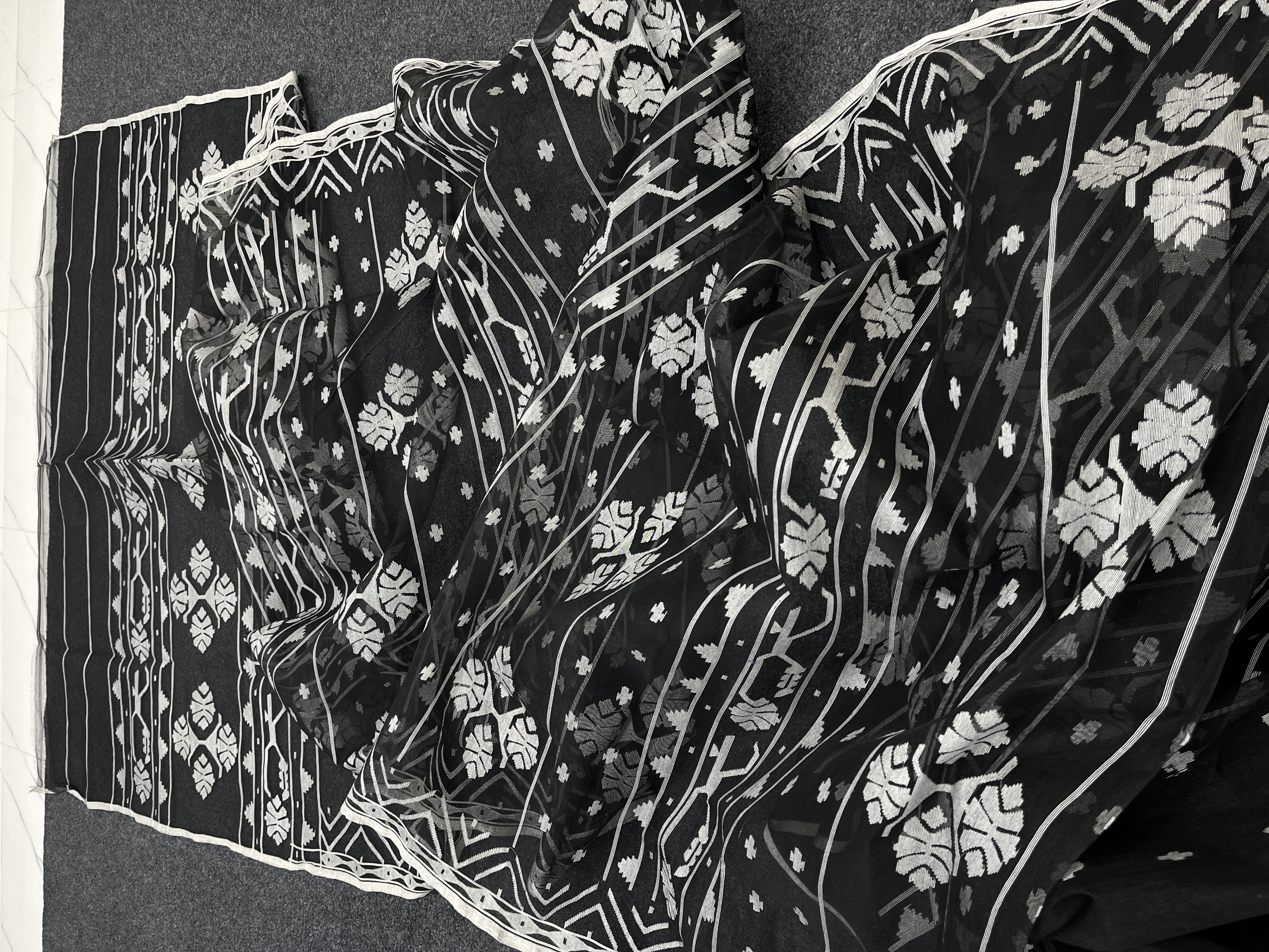 Exclusive black and white gorgeous half silk jamdani saree