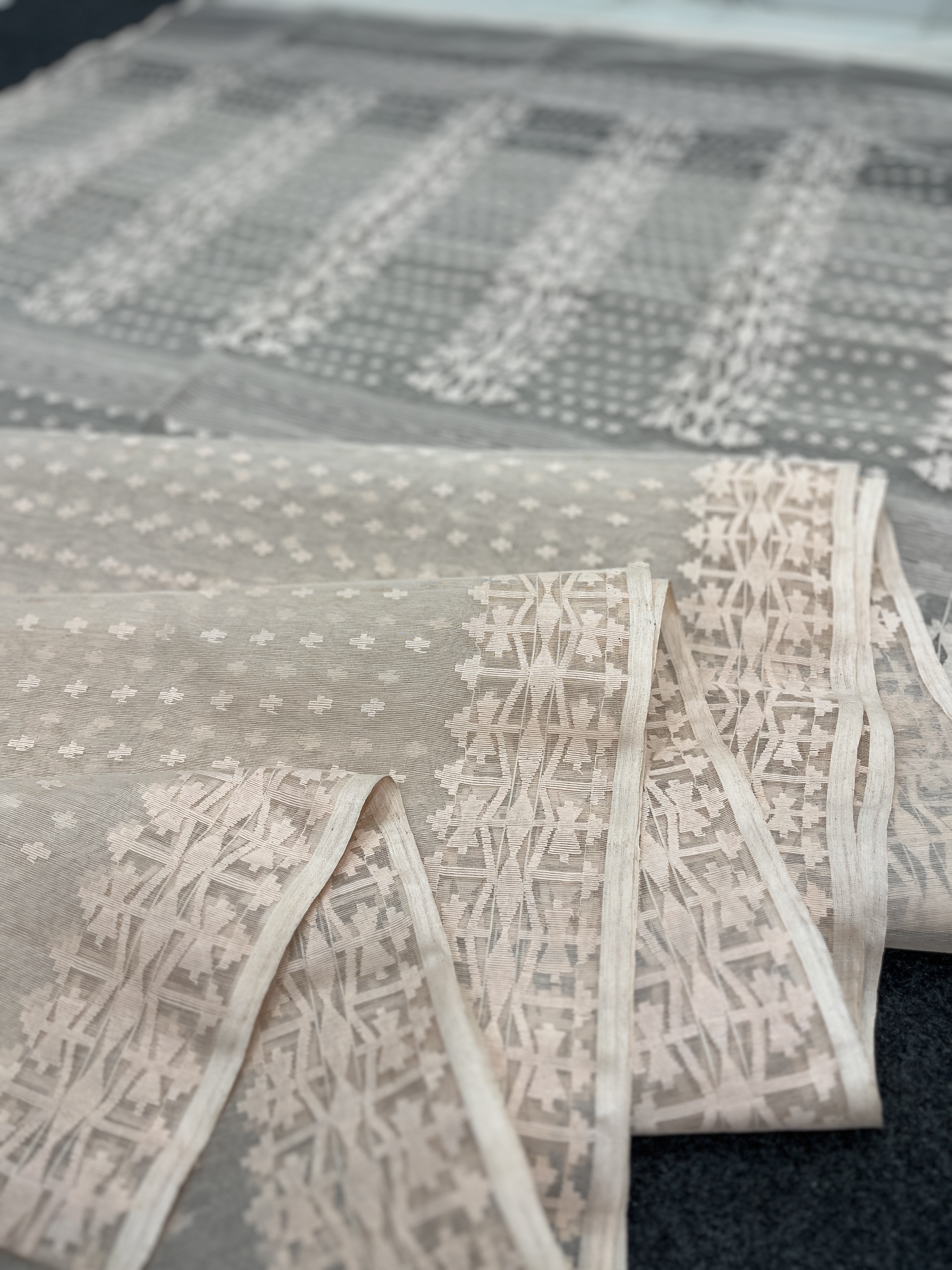 Dusky pink exclusive half silk jamdani saree